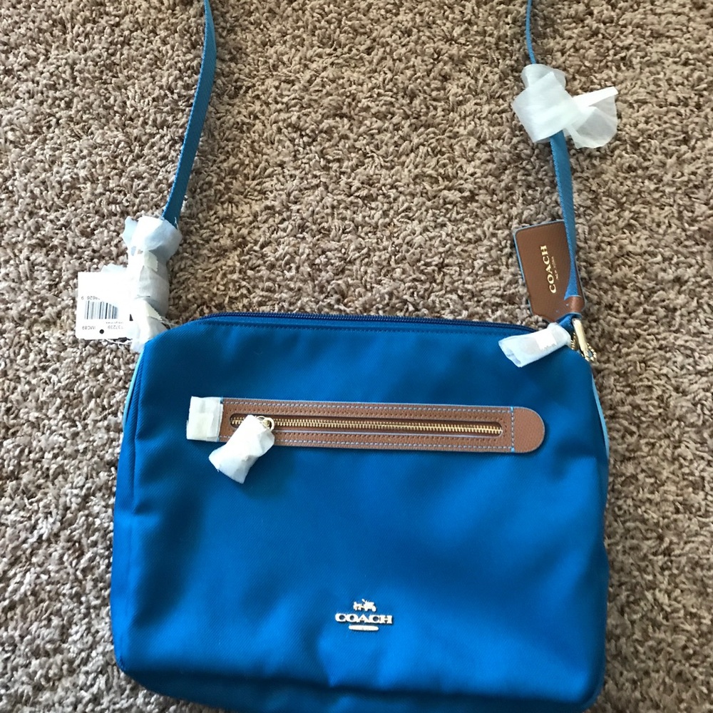 Coach blue nylon crossover handbag